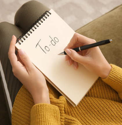 Bild-Schreibblock-Stift-Hände